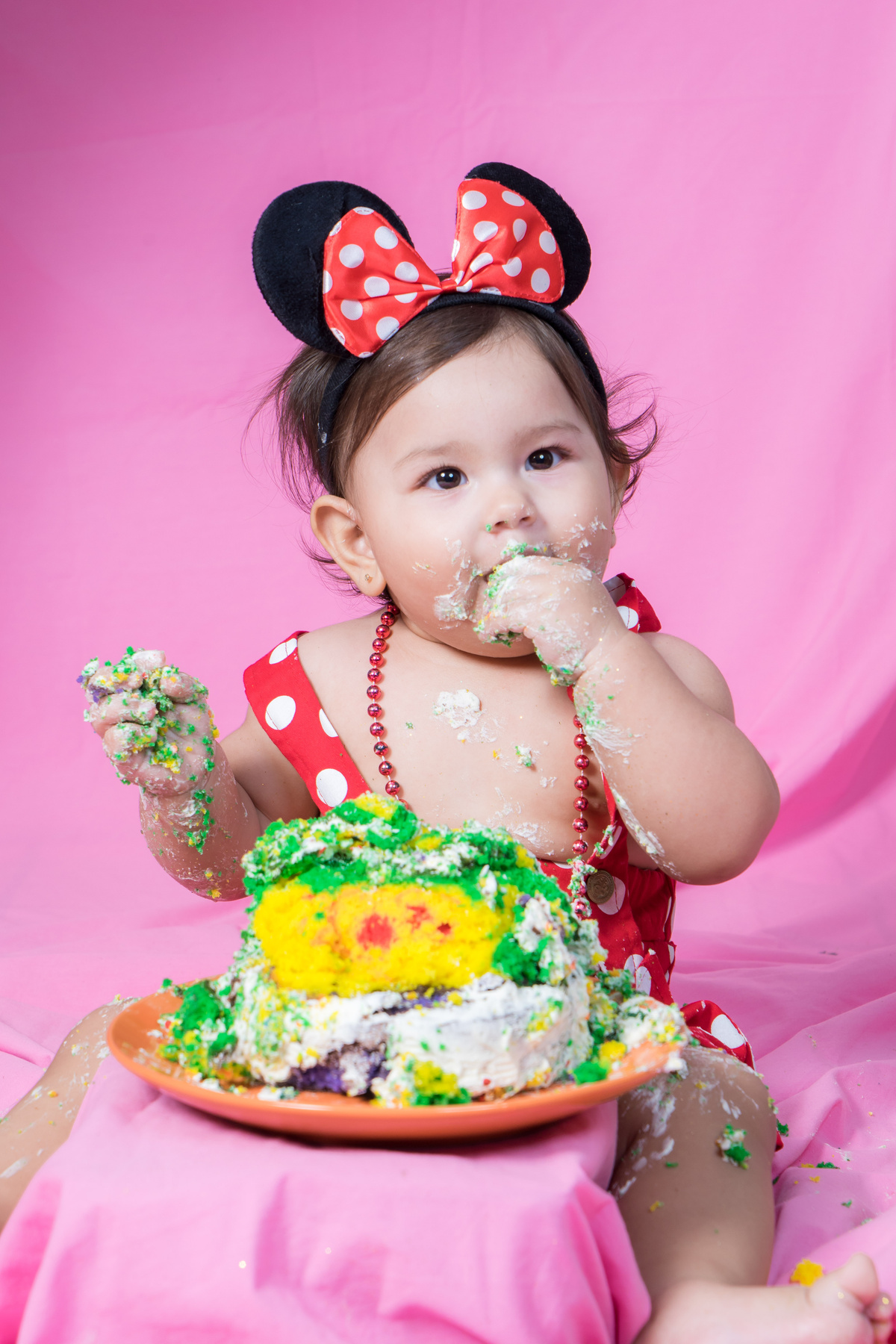 A Baby Eating Cake